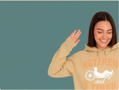 Woman smiling in a retirement-themed hoodie